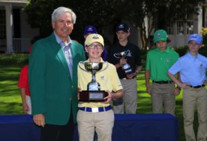 Liam Hartling being awarded a trophy